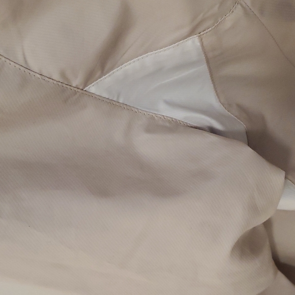 Nike golf windbreaker size medium. Color tan with white contour under arm area. - Picture 3 of 5